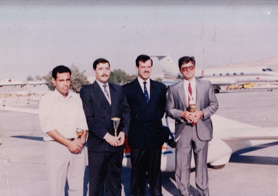 Bashar and fellow glider pilots holding trophies at Amman airport